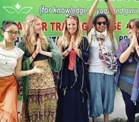 Students smiling at Avatar Yoga School in Rishikesh