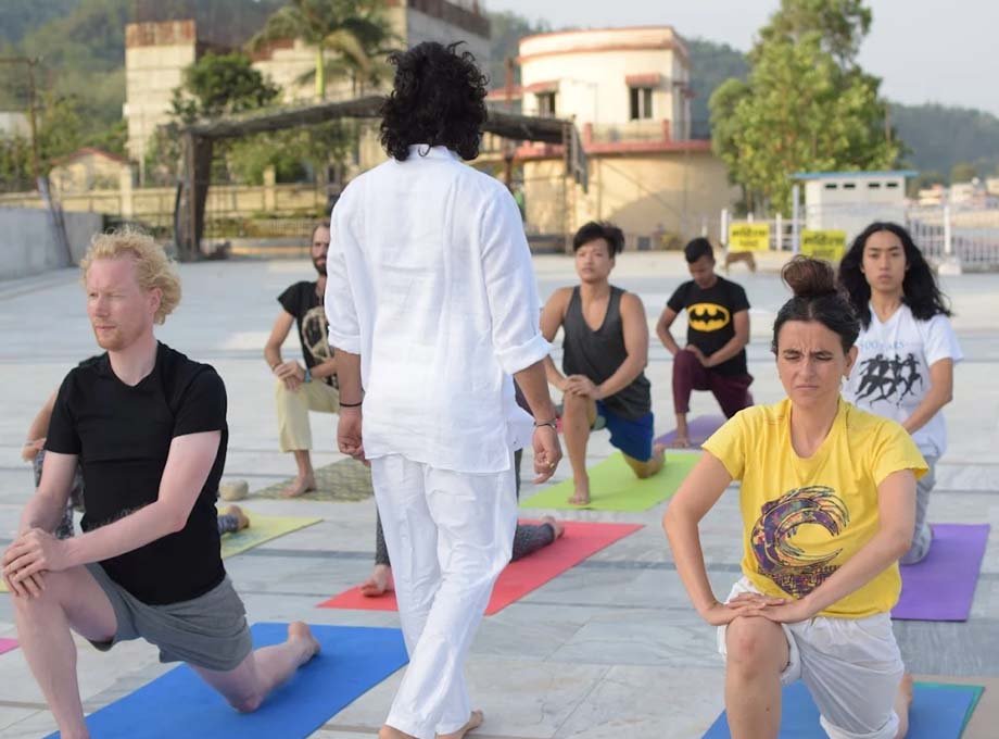 Hatha yoga practice on the Ganga ghat in Rishikesh