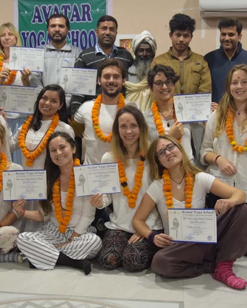 Students with certificates on graduation day
